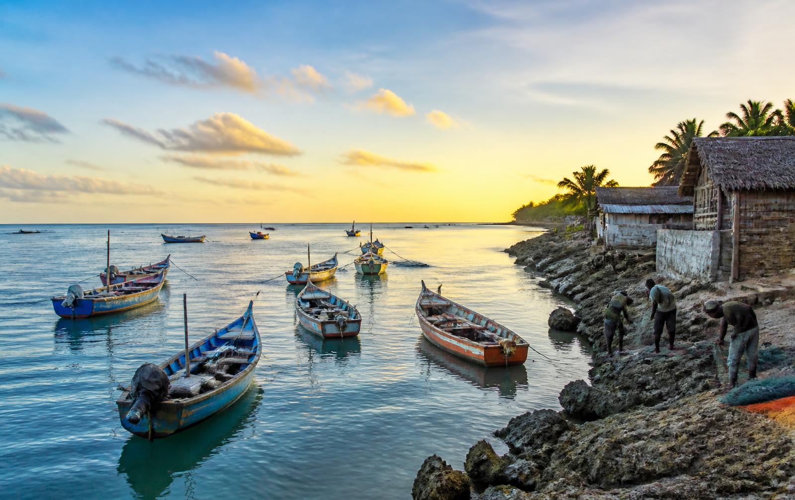 Colourful wooden fishing boats at sunrise off Kizimkazi, southern Zanzibar